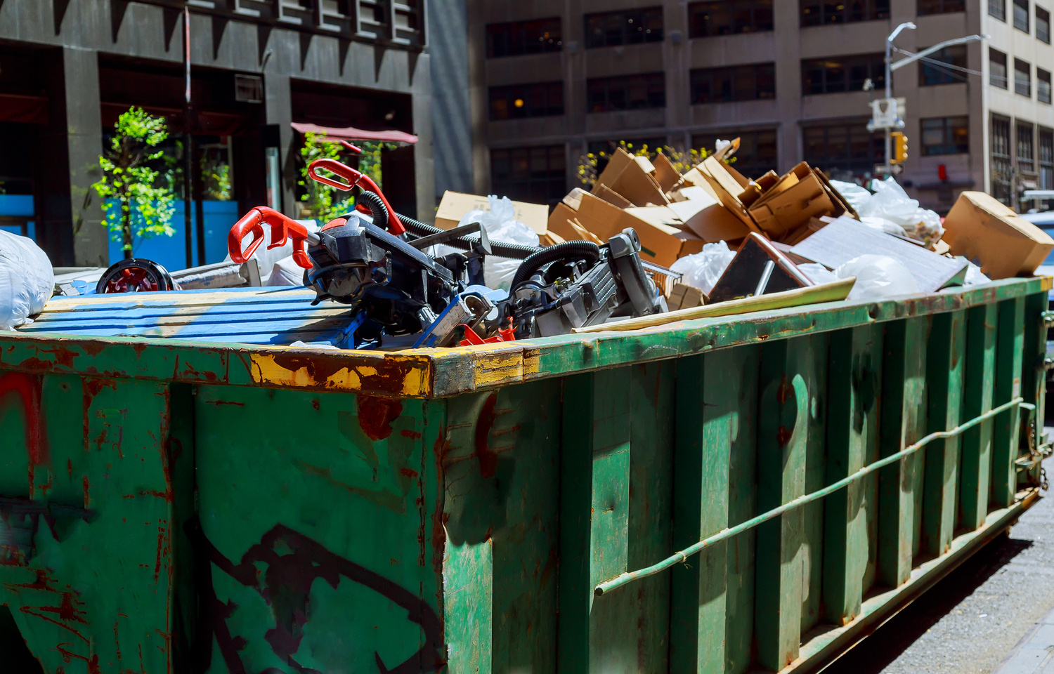 NEW YORK CITY - May 04, 2017 New York City Manhattan over Flowing Dumpsters Being Full with Garbage